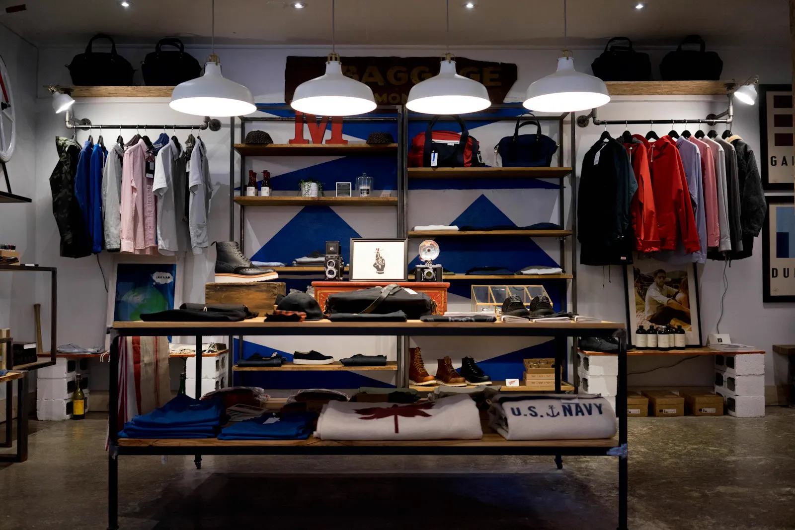 Independent shop displaying clothing, bags, and everyday goods